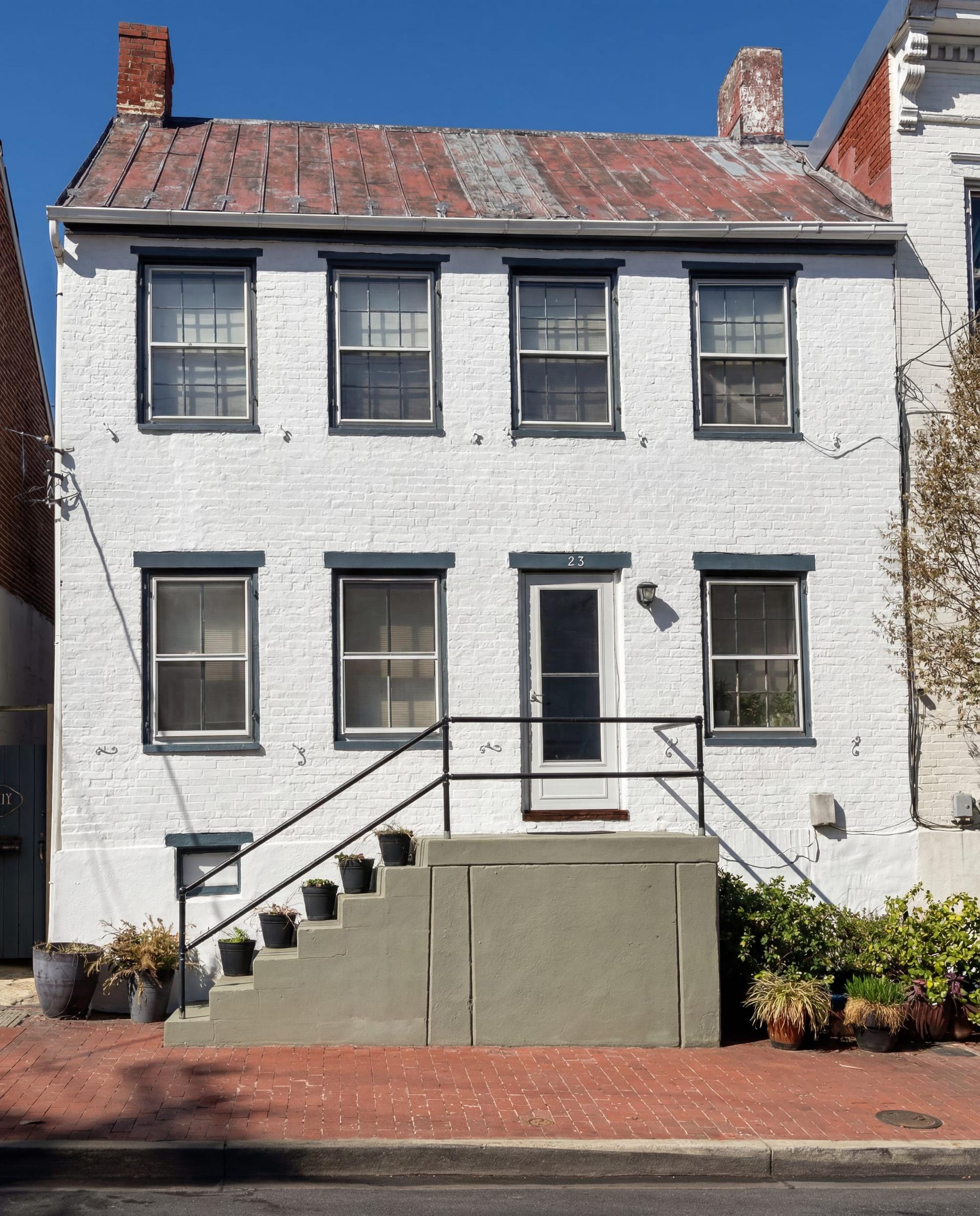 Exterior paint restoration on a historical building in Frederick, MD